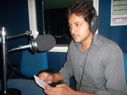 Rahul of B.Sc.IT in recording at Radio Dhum