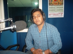 Saurav of B.Sc.IT in recording at Radio Dhum